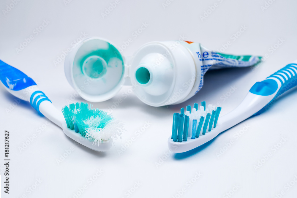 Image of used old and new toothbrushes isolated on a white background Image of used old and new toothbrushes isolated on a white background