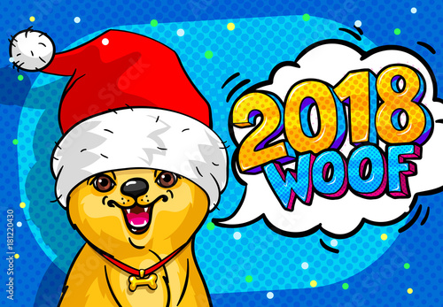 Dog in Santa Claus hat with open mouth and speech bubble. photo