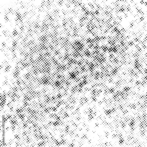 Halftone black dots over white background