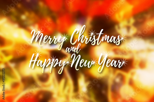 Merry Christmas and Happy New Year golden font on blury holiday party background.