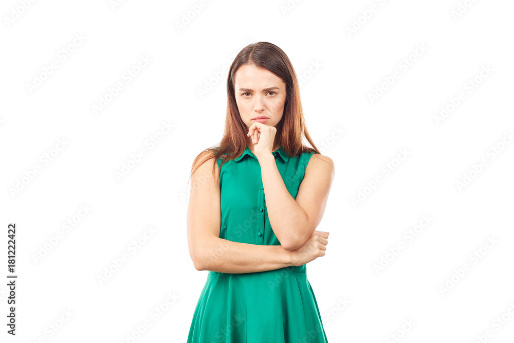 Portrait of emotional young woman in emerald green dress on white background Portrait of emotional young woman in emerald green dress on white background