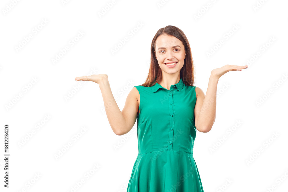 Portrait of emotional young woman in emerald green dress on white background Portrait of emotional young woman in emerald green dress on white background