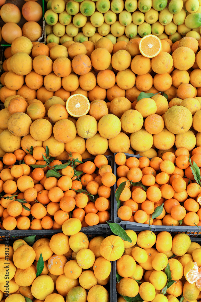 Ripe citrus fruits background.