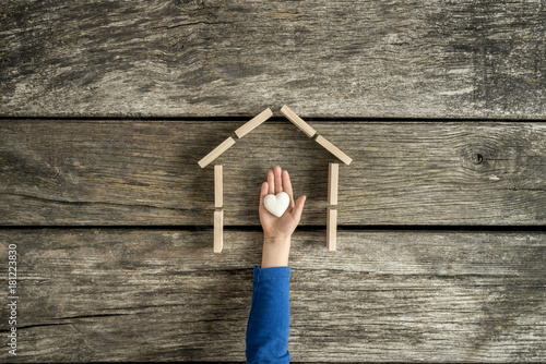Photos Young child indicating his love for his home