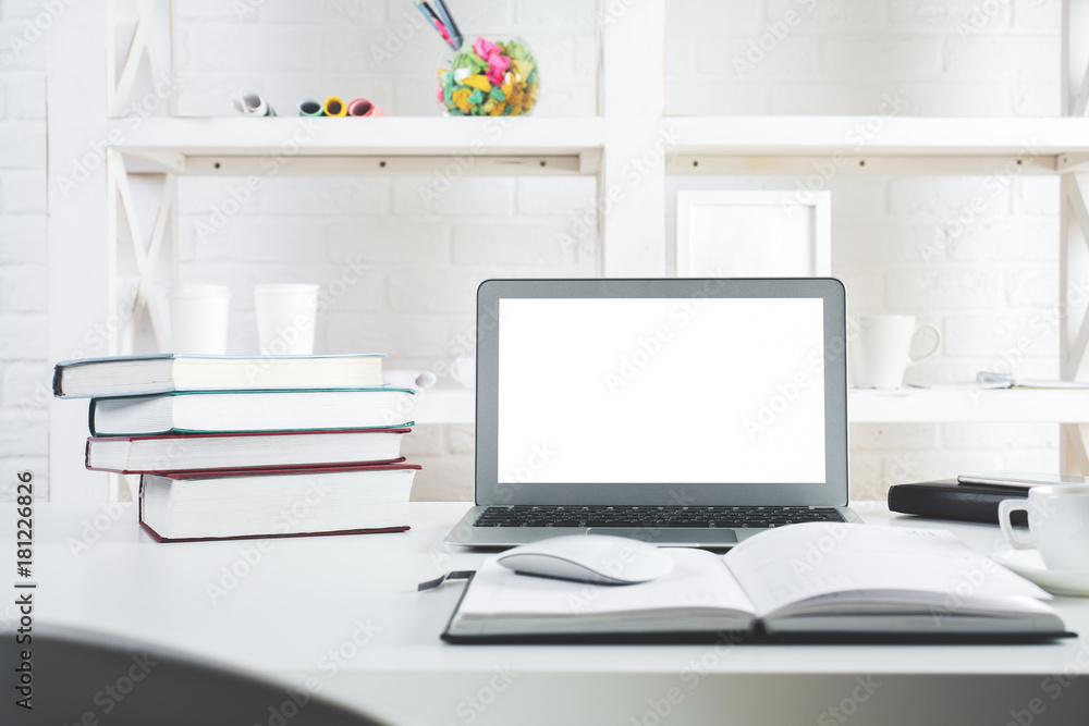 Hipster office desktop with blank laptop screen Hipster office desktop with blank laptop screen