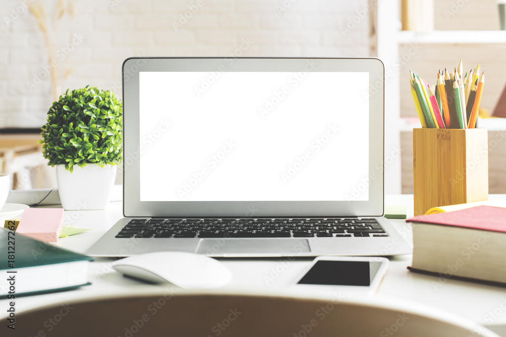 Fototapeta premium Creative desktop with empty white laptop screen