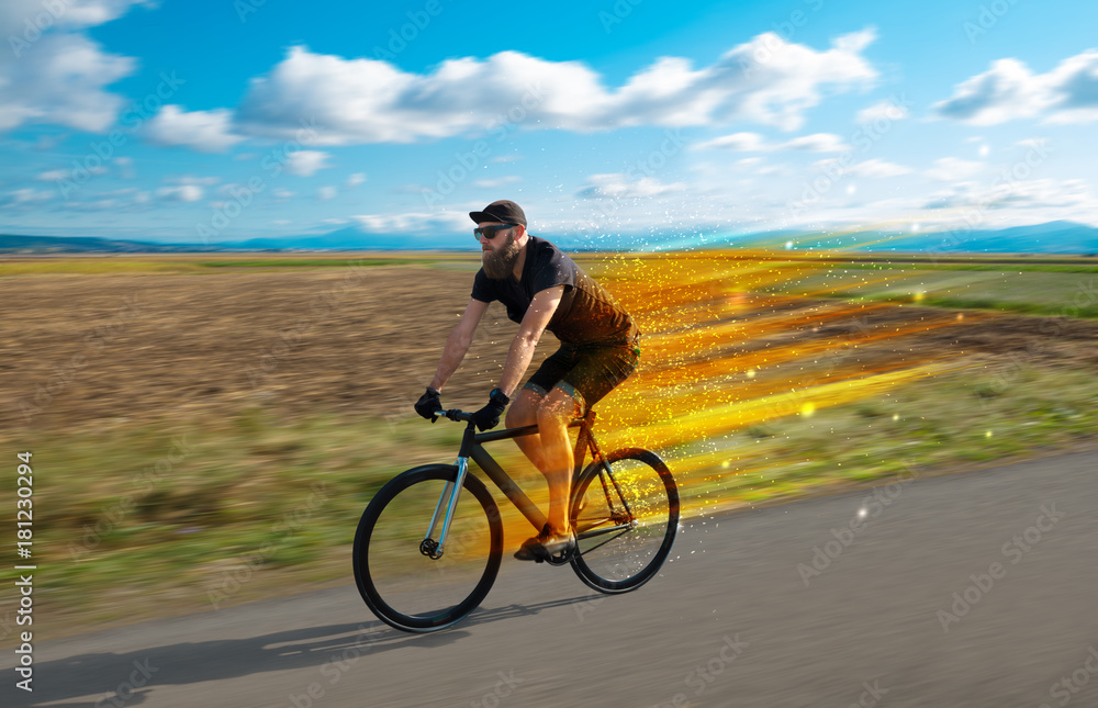 Young riding bicycle in nature Young riding bicycle in nature