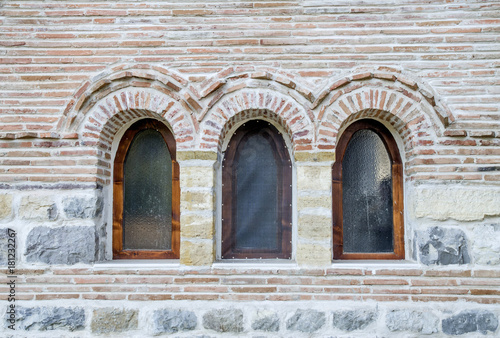 Wallpaper Mural Three small arch windows on a brick wall Torontodigital.ca