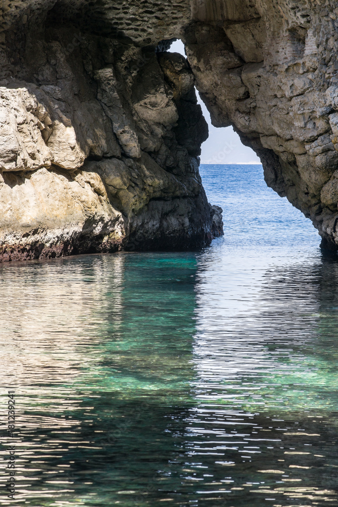Rocky sea gate on Italian coastline, near Sorrento, Campania
