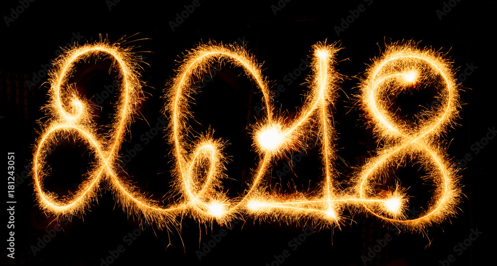 2018 with sparklers on black background 2018 with sparklers on black background