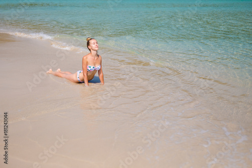 Yoga on tropical Thailand beach