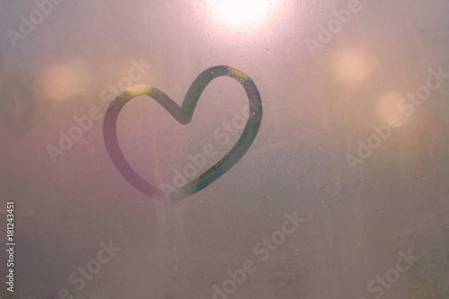 Heart drawn from water on glass or Sweet heart.