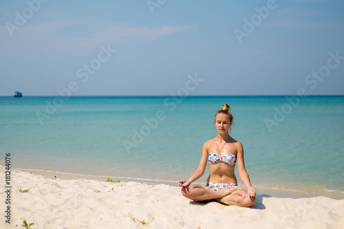 Yoga on tropical Thailand beach