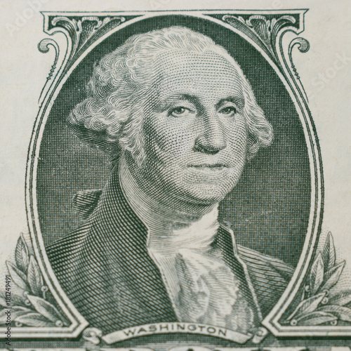 Portrait of George Washington on 1 dollar bill, close-up.