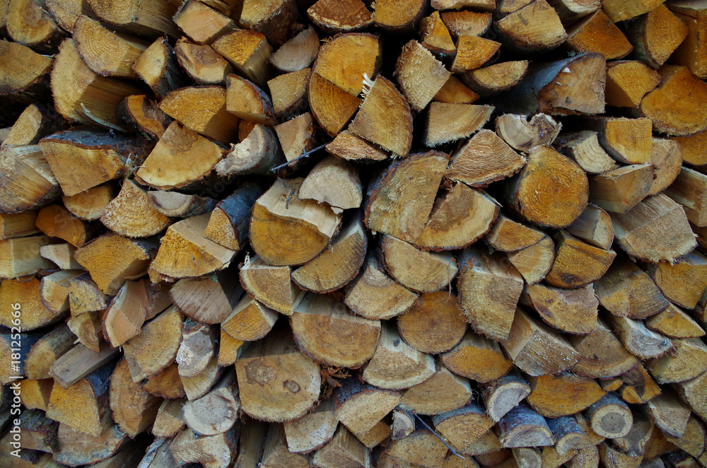 Woodpile background. Firewood prepared for fireplace. Woodpile background. Firewood prepared for fireplace.