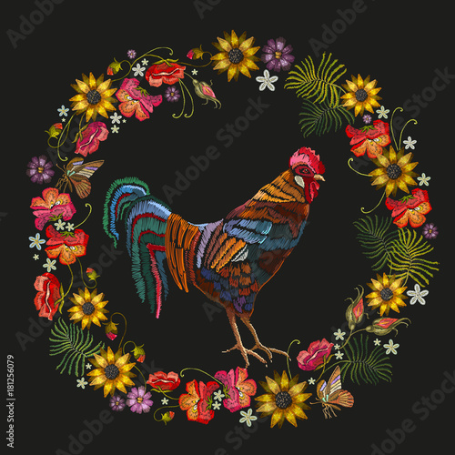 Embroidery rooster and wreath of flowers. Fashion template for clothes, textiles, t-shirt design. Classical embroidery beautiful male rooster, red roses, peonies, sunflowers, butterflies
