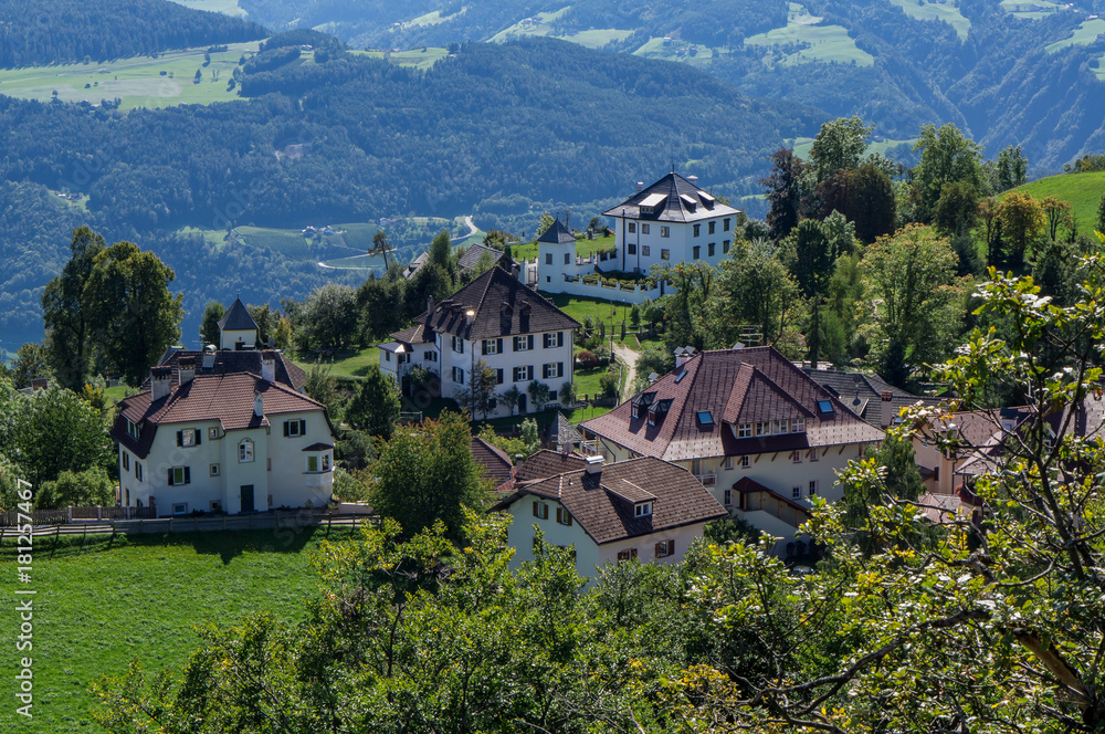 Italian village in Alps mountain at sunny summer day. Soprabolzano,  Oberbozen