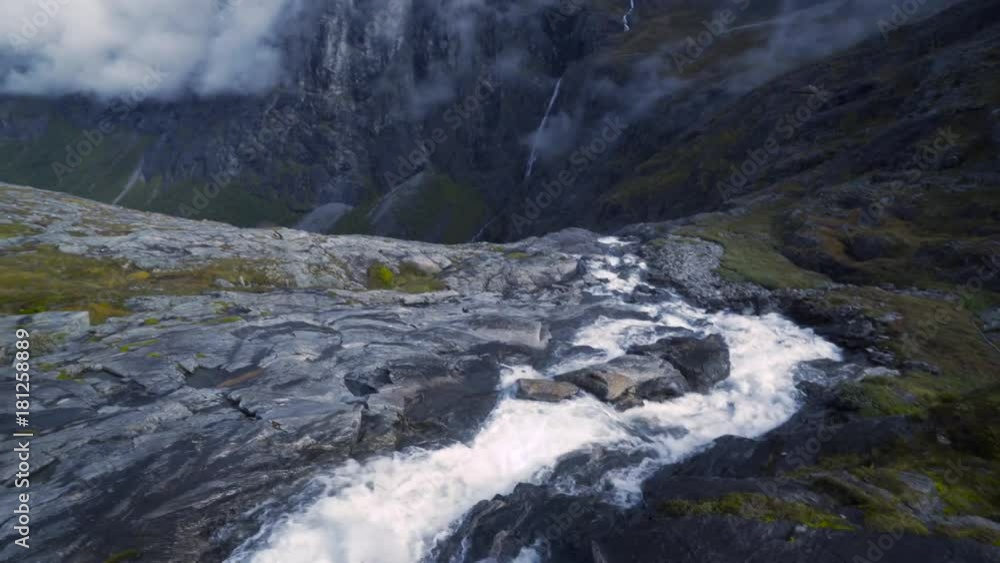 4K Trollstigen Road Norway Cars and Waterfall from Aerial View, Pan Bottom Right 4K Trollstigen Road Norway Cars and Waterfall from Aerial View, Pan Bottom Right