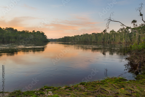 Beautiful sunrise on the Autana river, in the amazonian jungle, in Venezuela