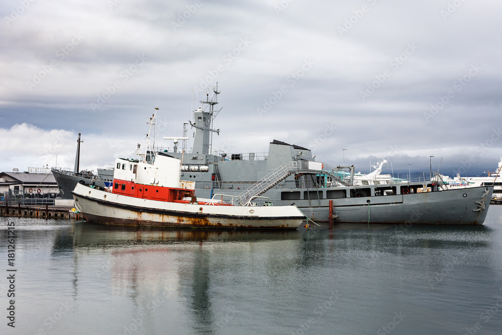 various ships in Reykjavik city port in autumn