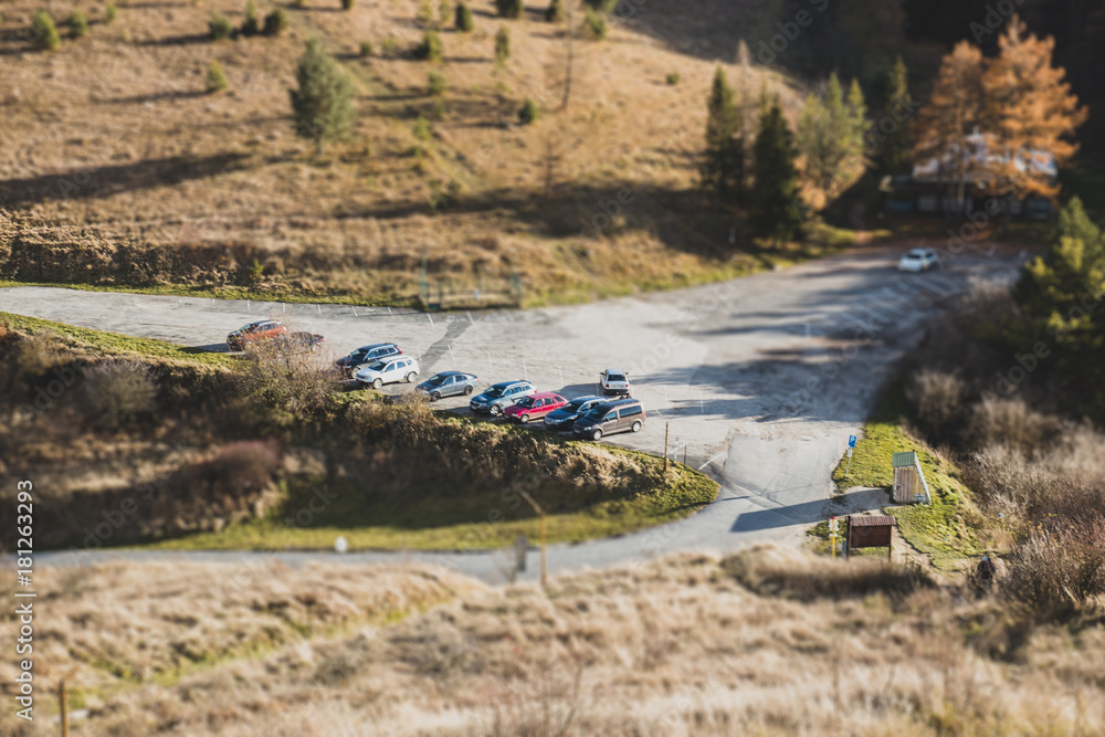 Naklejka premium Parking on nature close, tilt shift effect