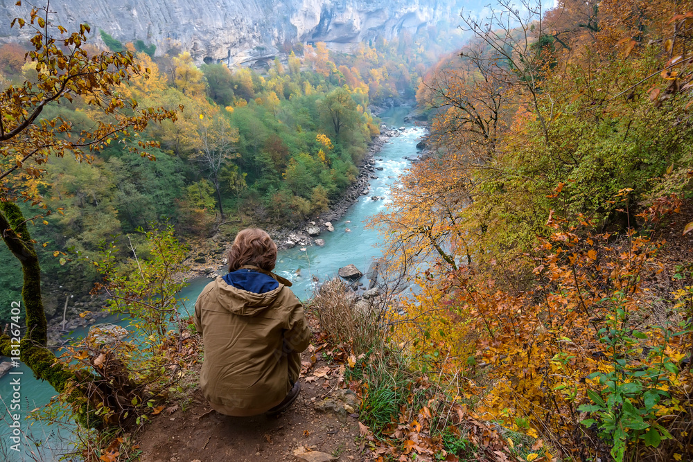 Freedom concept. Traveler over autumn landscape Freedom concept. Traveler over autumn landscape