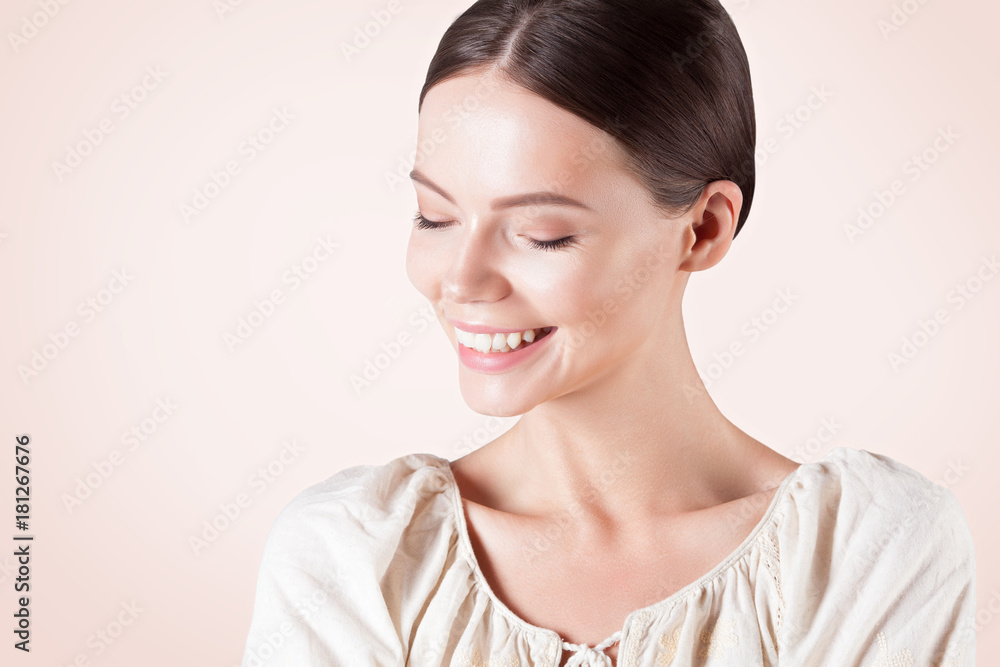 Smiling beautiful woman with clean perfect skin close-up Smiling beautiful woman with clean perfect skin close-up