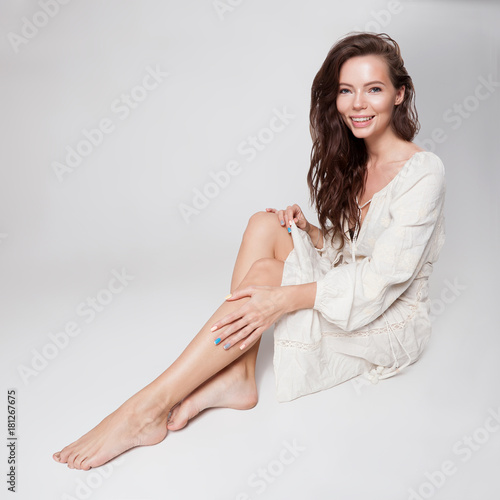 Beautiful young pretty girl on white background © Mirrorstudio