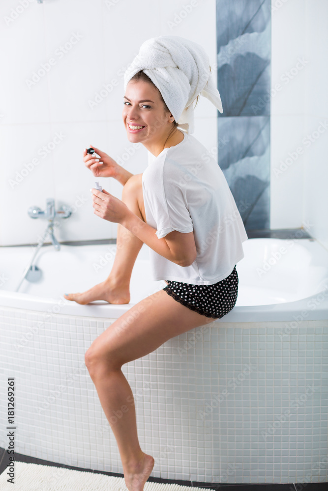 Woman in the bathroom Woman in the bathroom