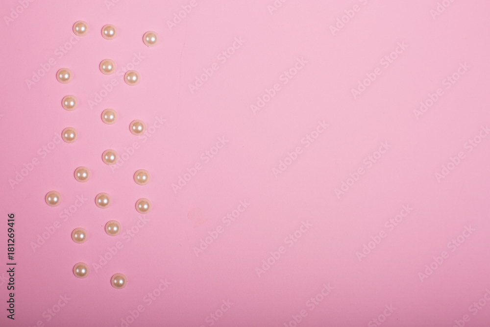 Pearls on a pink background