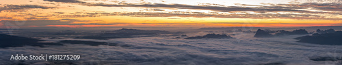 Panoramic of the rainy season with foggy at morning, Mountain top view of sunrise landscape in the rainforest, Thailand