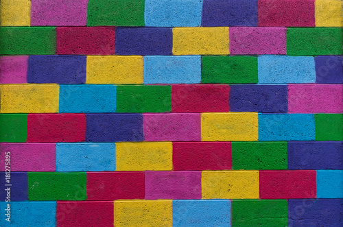 Cinder block stone wall Colourfully painted background texture