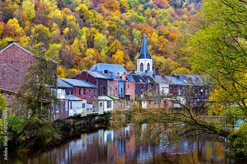 View of Vesdre river and church of Saint Francois Xavier in Belgian town of Chaudfontaine, Wallonia