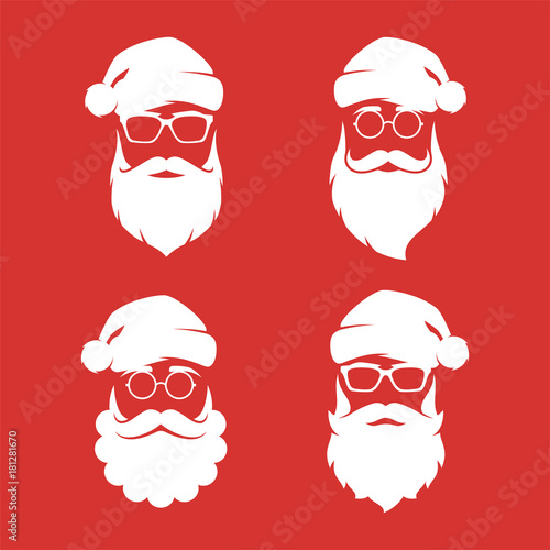 Collection of four vector hipster style Santa Claus silhouettes.