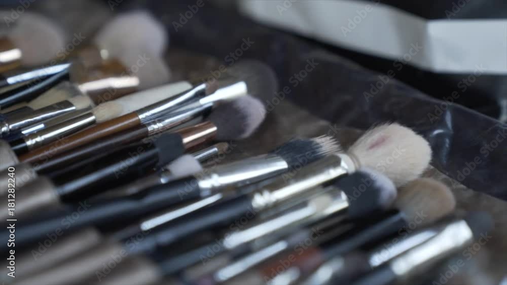 Brush background A makeup brush is a tool with bristles used for the application of makeup or face painting. Brush background A makeup brush is a tool with bristles used for the application of makeup or face painting.
