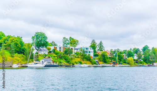 Photography Houses stretched along bygdoy peninsula in Oslo, Norway