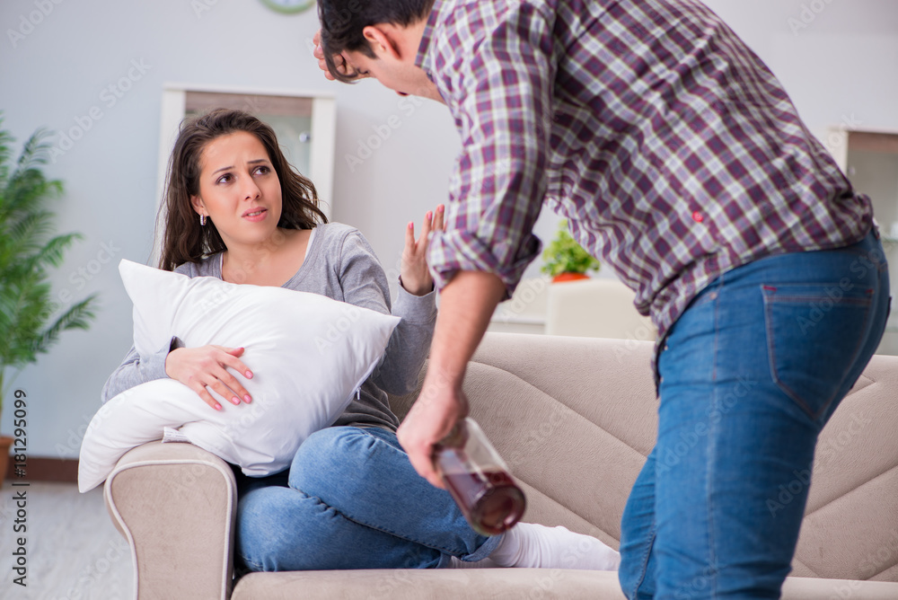 Domestic violence concept in a family argument with drunk alcoho Domestic violence concept in a family argument with drunk alcoho