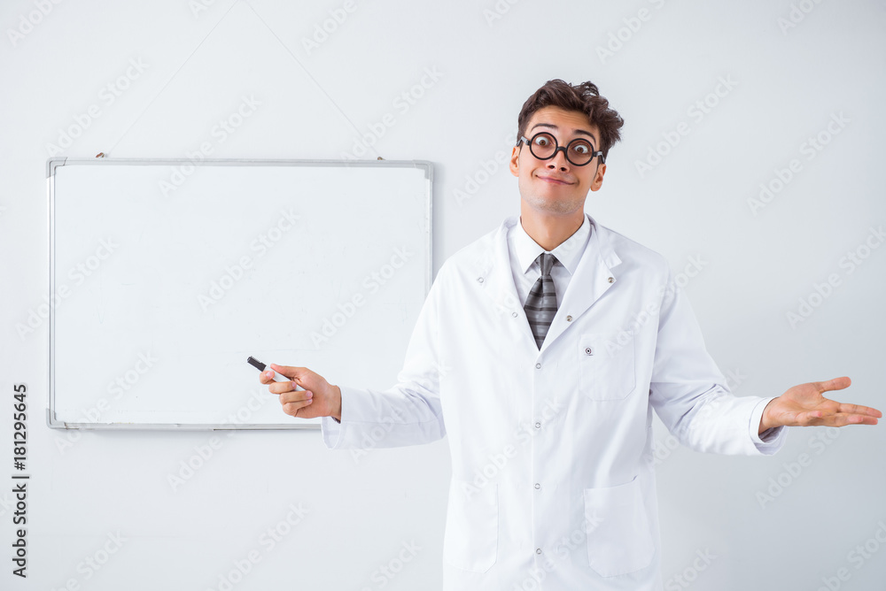 Funny doctor scientist making presentation in hospital Funny doctor scientist making presentation in hospital