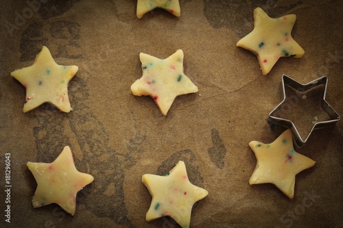 Star shaped xmas raw sugar cookies ready to bake / Christmas baking