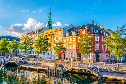 View of a channel next to the Christiansborg Slot Palace in Copenhagen, Denmark. photo