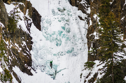 Wallpaper Mural Person climbing a frozen waterfall Torontodigital.ca