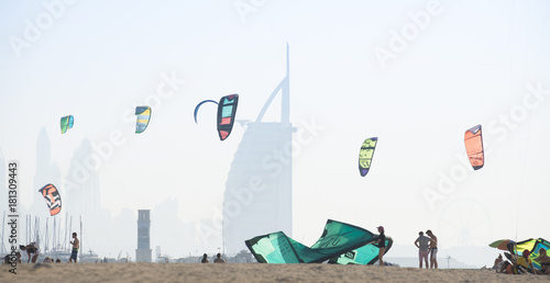 Photography Kite surf kites flying over Jumeirah public beach in Dubai, UAE.