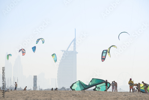 Kite surf kites flying over Jumeirah public beach in Dubai, UAE.
