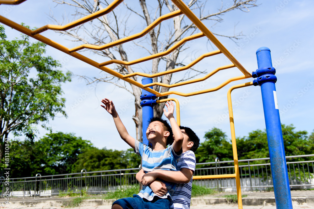 Young asian boy hang out door playground Young asian boy hang out door playground