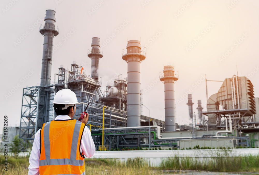 Engineer using walky talky for control team maintenance steam