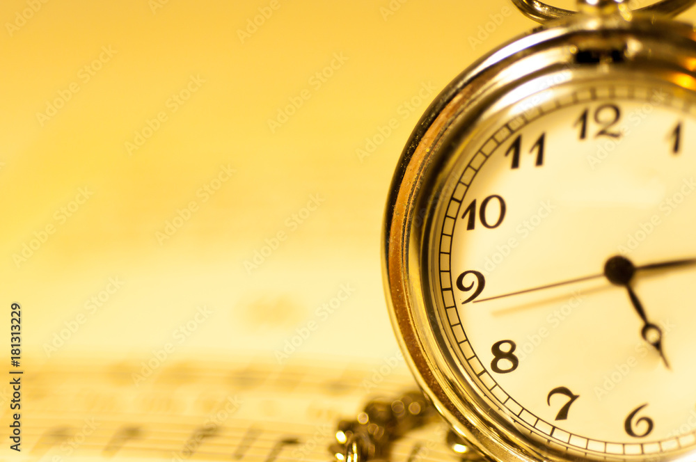 Old pocket watch, musical notes, time for music conceptual image , yellow , warm tone. Old pocket watch, musical notes, time for music conceptual image , yellow , warm tone.