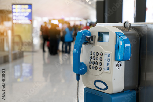 Public payphone telephone inside the international airport. Public telephone corner for passenger or traveler.