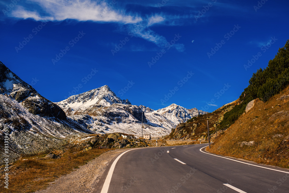 Fototapeta premium Landscape of the Swiss Alps and forest of national parc in Switzerland. Alps of Switzerland on autumn. Fluela pass road. . Swiss canton of Graubunden. Val Müstair Region