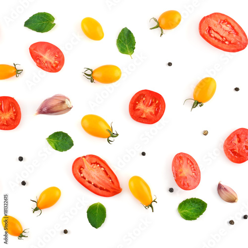Fototapeta Naklejka Na Ścianę i Meble -  Healthy food background.Tomatoes and spices isolated on white background.