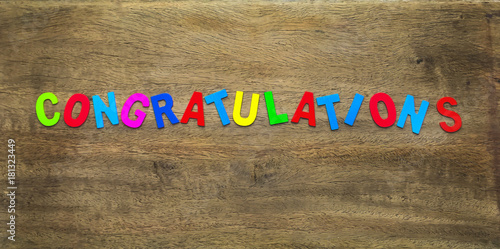 congratulations text on wood board